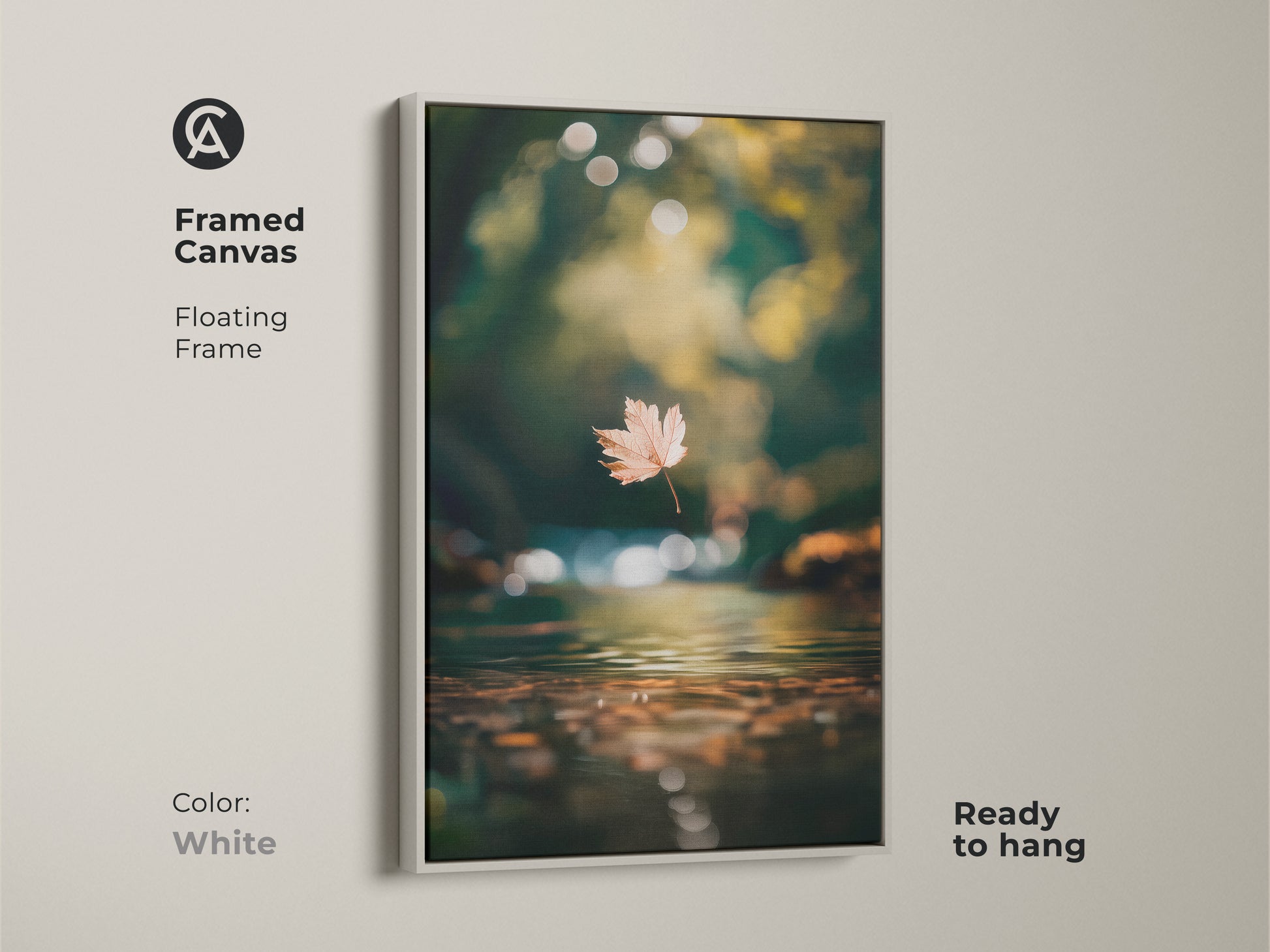Enhance your space with this framed canvas artwork in white. The floating frame enhances the beauty of this autumn leaf scene. Ready to hang this piece brings a touch of nature indoors. Get this framed fine art to elevate your decor.