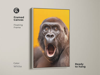 Framed canvas showcasing realistic gorilla artwork. This primate art has a floating white frame. The wildlife wall art is ready to hang. It is a yellow orange canvas.