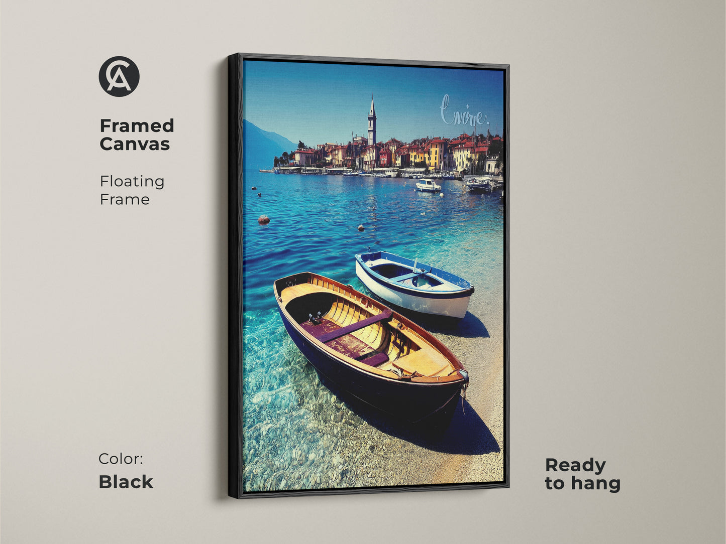 Black framed canvas art of a European coastal town. This floating frame enhances the blue boats art on clear water. Ready to hang it's perfect for a coastal dining room. Bring realistic seascape wall art to your home. Makes a great housewarming gift for beach lovers.