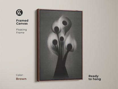 Framed canvas artwork of a gothic flower in black and white. This surreal botanical art print with an antique gold floating frame is ready to hang. This dark academia art suits a study room or office workspace. Elevate your home decor with artistic accents.