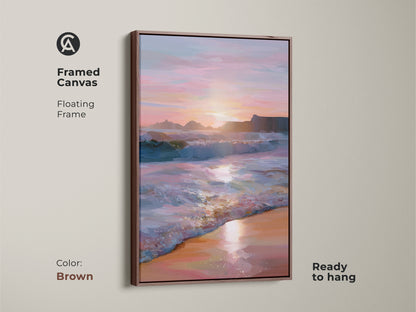 Framed canvas art featuring an ocean sunset and crashing coastal waves. A brown floating frame enhances the teal pink orange landscape. Ready to hang piece for a housewarming gift. An impressionistic beach art for your home decor canvas.