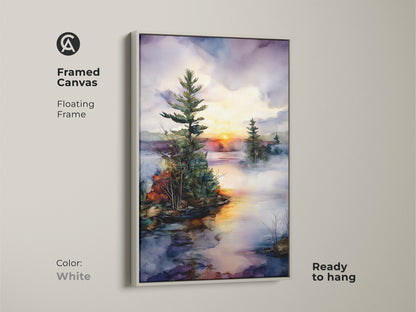 White framed canvas art displays a watercolor pine tree on a misty lake at sunset. This nature inspired artwork complements any decor. A serene landscape for bedroom wall decor canvas.