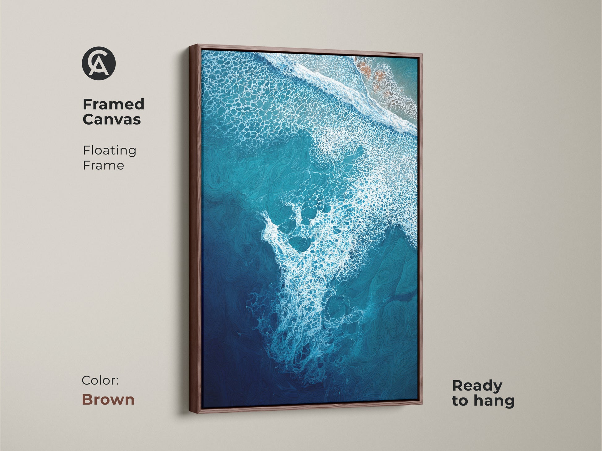 Framed canvas floating frame in brown displays deep blue ocean wave artwork. This turquoise aerial view art adds a coastal touch to any space. Ready to hang this abstract print is ideal for beach lovers. Modern abstract seafoam art to transform your home. A captivating abstract seascape painting.