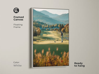 Brighten your walls with this framed canvas golf artwork. This artwork captures a golfer on a green course with mountains in the background. The white floating frame offers a clean and modern look. Ready to hang and enjoy in any room.