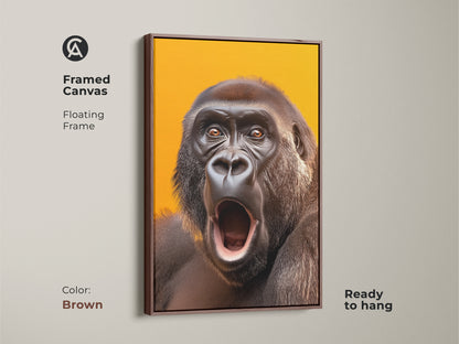 Framed canvas featuring realistic gorilla artwork. This primate art has a floating brown frame. The wildlife wall art is ready to hang. It is a yellow orange canvas print.