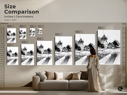 Size comparison of farmhouse windmill art prints. Inches and centimeters are shown for each size. See how the art fits above a sofa. Visualize the perfect scale for your space with this black and white windmill canvas.