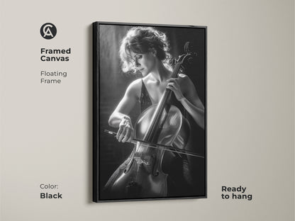 Framed canvas with a black floating frame showcasing a cello player. This ready-to-hang artwork is a contemporary cello decor piece. The black and white fine art photography adds sophistication.