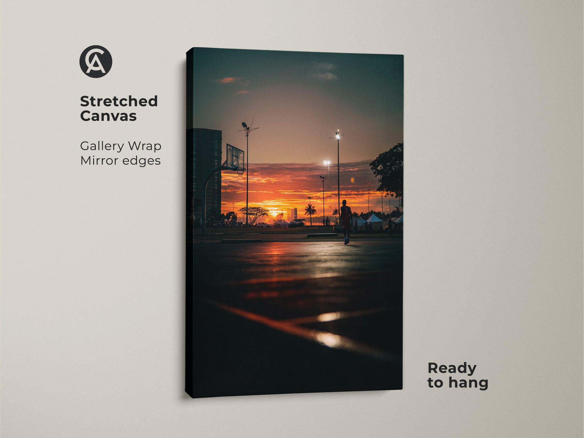 Stretched canvas art featuring a sunset over a basketball court. Gallery wrapped with mirrored edges. This ready-to-hang artwork brings the beauty of a vibrant sunset into any room.