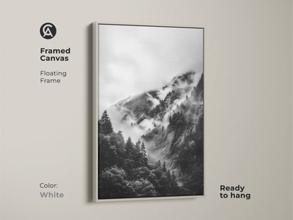 White framed canvas art featuring a monochrome mountain forest. Floating frame enhances the black and white landscape. Ready to hang tree silhouette art for bedroom wall art.
