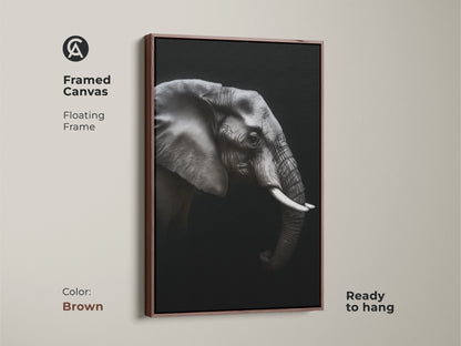 Framed monochrome elephant canvas in a brown floating frame. Ready to hang black and white wildlife artwork adds a contemporary touch. Ideal animal portrait canvas for modern office wall art. This elegant animal print is a perfect gift for wildlife enthusiasts.
