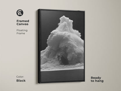 Framed monochrome wave canvas art in a black floating frame. This black and white ocean print is ready to hang. Contemporary sea spray decor for a modern space. The surfer beach wall art adds a coastal touch. A stylish ocean storm canvas for a contemporary home.
