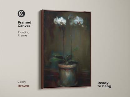 Framed canvas of an emerald green orchid artwork with a brown floating frame. Ready to hang contemporary botanical decor. This floral canvas art enhances any space. A sophisticated gift for plant lovers. The potted plant artwork adds elegance.