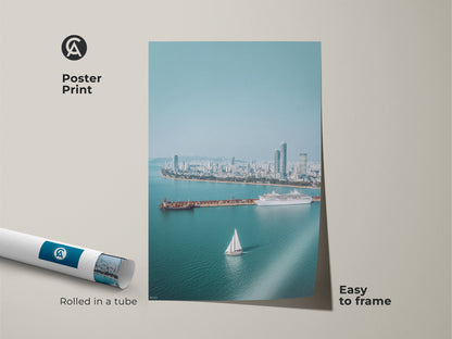 Poster Print of an aerial cityscape with a sailboat and cruise ship. Rolled in a tube. Easy to frame. Features blue teal modern photography perfect for a travel enthusiast gift.