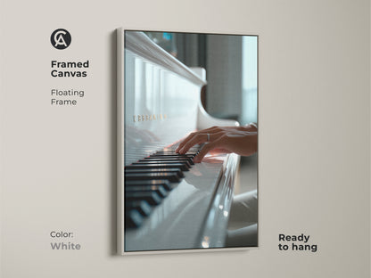 Framed canvas featuring a poised hand on piano keys. The floating frame is white and ready to hang. Elevate your home with this elegant music artwork. This art piece is perfect for music lovers.