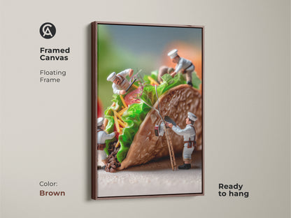 Framed canvas artwork of miniature chefs constructing a taco. The floating frame is brown. This food art brings warmth to your space. The chefs are adding colorful toppings. Ready to hang this piece is a unique culinary art statement.