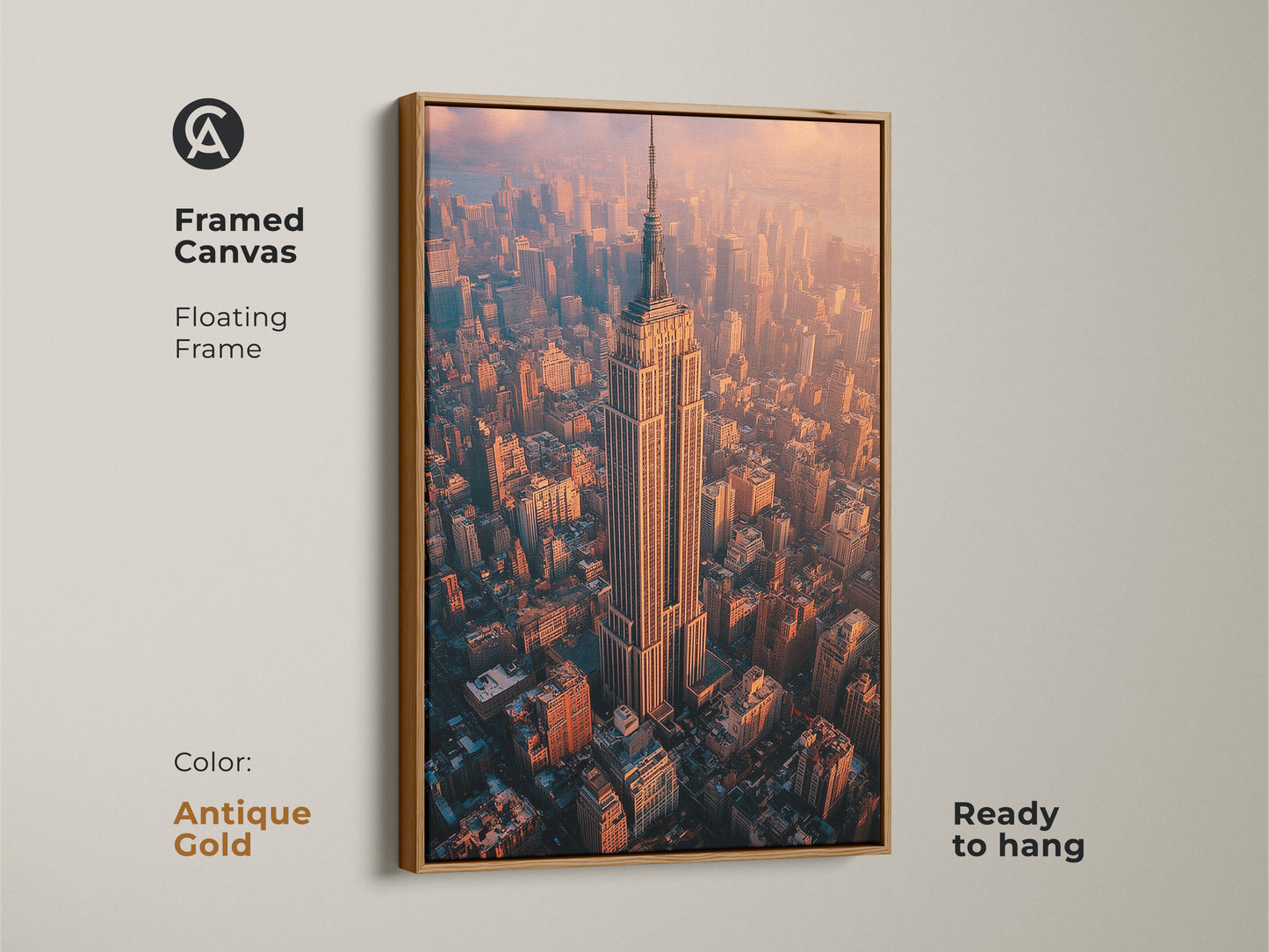 Framed canvas floating frame in antique gold featuring the Empire State Building. A stunning aerial NYC photography print that's ready to hang. The artwork captures a breathtaking golden hour cityscape. Perfect as a sophisticated wall art piece. It adds a contemporary touch to any room. Ideal as a New York themed gift for architecture lovers.