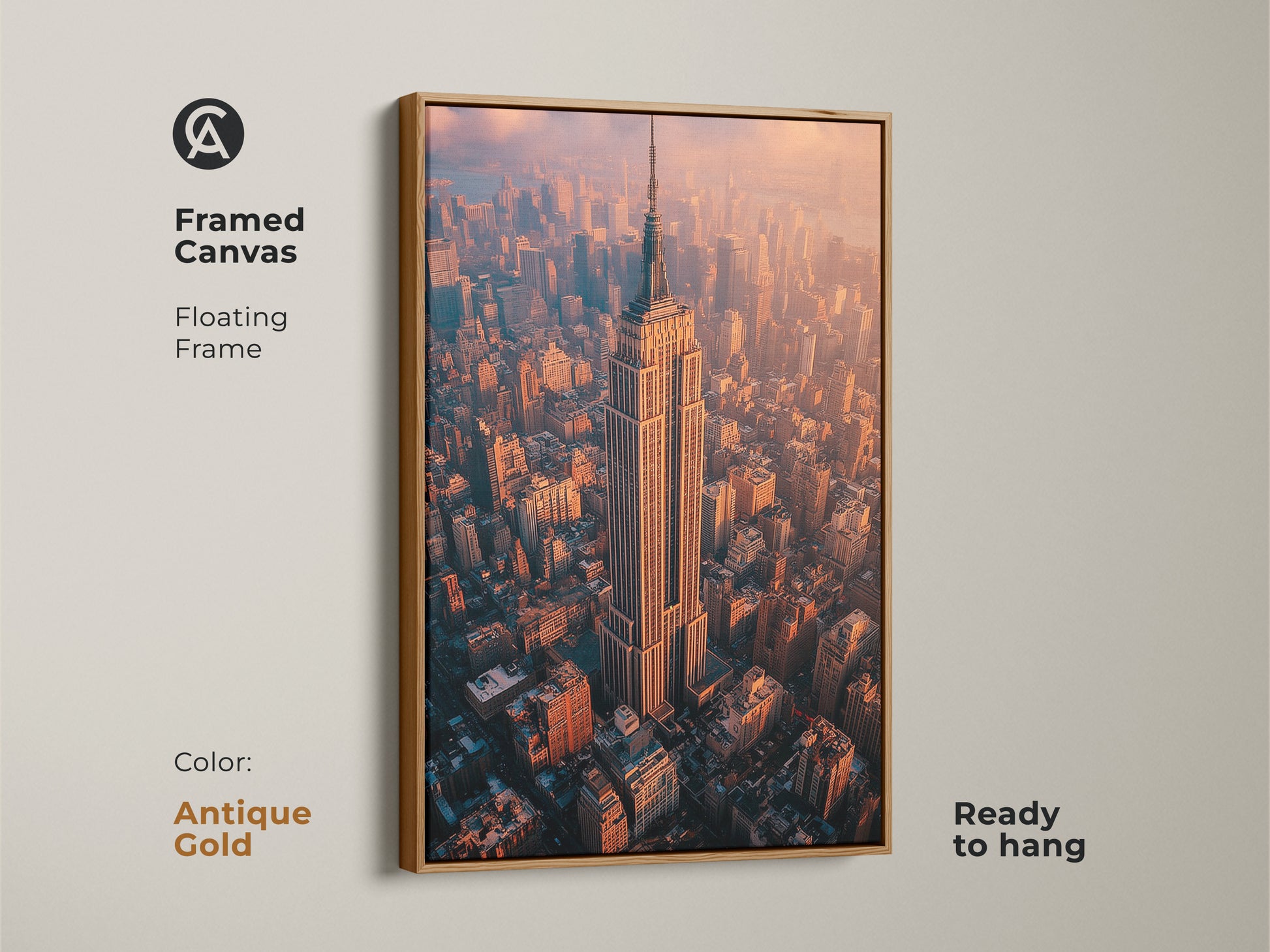 Framed canvas floating frame in antique gold featuring the Empire State Building. A stunning aerial NYC photography print that's ready to hang. The artwork captures a breathtaking golden hour cityscape. Perfect as a sophisticated wall art piece. It adds a contemporary touch to any room. Ideal as a New York themed gift for architecture lovers.