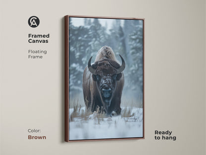 Framed canvas artwork of a bison in a winter scene. The floating frame is brown. This art piece is ready to hang. This wildlife art print brings a natural touch to your home decor. Perfect for living rooms or offices. Add warmth and style today.