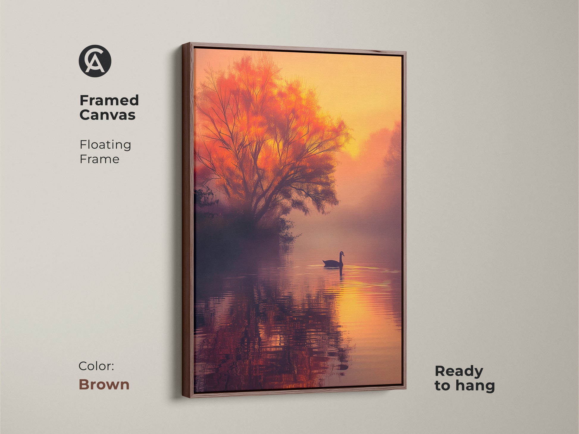 This framed canvas artwork presents a tranquil lake at sunset. A swan is gliding across the water. A fiery tree adds warmth. The floating frame in brown offers a classic look. This ready-to-hang piece brings nature indoors. Find the perfect framed art for your home.