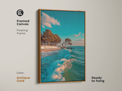 Framed canvas art featuring a teal blue ocean wave on a beach. This coastal artwork has an antique gold floating frame. Ready to hang this piece adds elegance to any room. Seaside trees wall decor enhances the coastal vibe. A perfect gift for those who love nautical art.