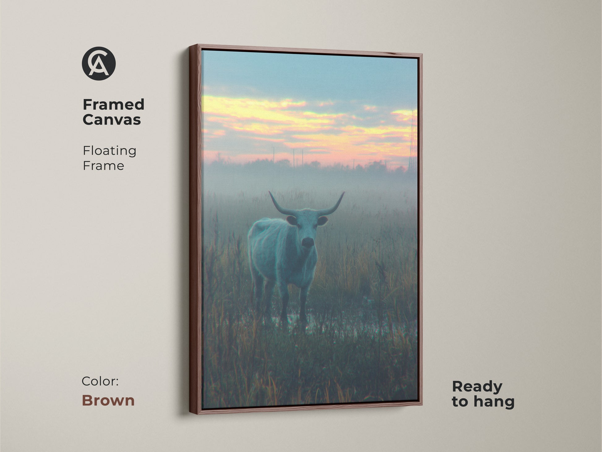 Brown framed canvas art print of a longhorn bull in a misty field. This floating frame canvas is ready to hang. The rich brown frame complements the serene artwork adding warmth to your living space.
