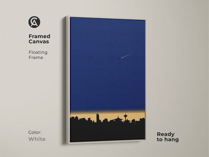 Framed Canvas showcasing minimalist cityscape artwork. This modern skyline art print is designed with a floating frame. The deep blue wall art suits any office. Geometric airplane wall decor that's ready to hang in white.