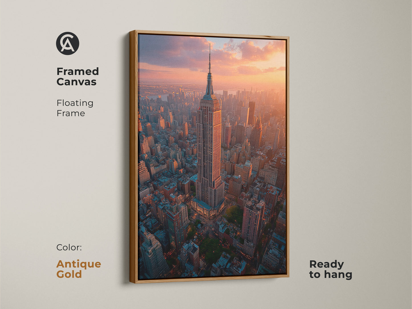 An antique gold framed canvas art features an aerial view of the Empire State Building during the golden hour. This NYC wall art ready to hang captures a realistic urban landscape. The contemporary artwork adds a touch of sunset elegance to any room