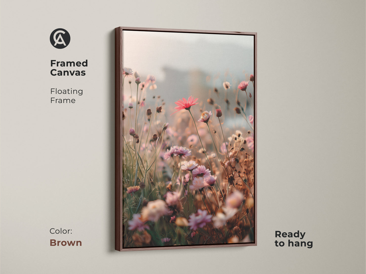 Framed Canvas in brown with a floating frame showcasing Soft Focus Floral Art Print. This coral pink daisy and cosmos botanical wall art adds boho blush pink to any room. Ready to hang and makes a great housewarming gift.