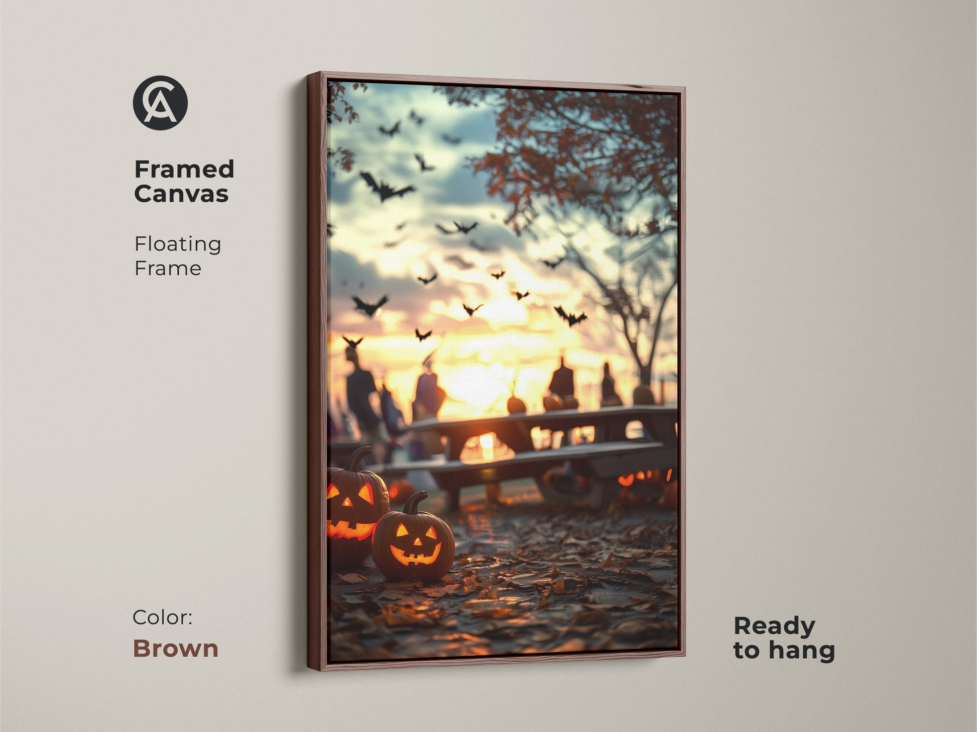 Framed canvas of Halloween art with a brown floating frame. Jack-o'-lanterns glow warmly. Bats fly against the dramatic autumn sunset. Ready to hang. This fall foliage wall art brings spooky charm. It is a perfect seasonal entryway art piece. A unique autumn gift.