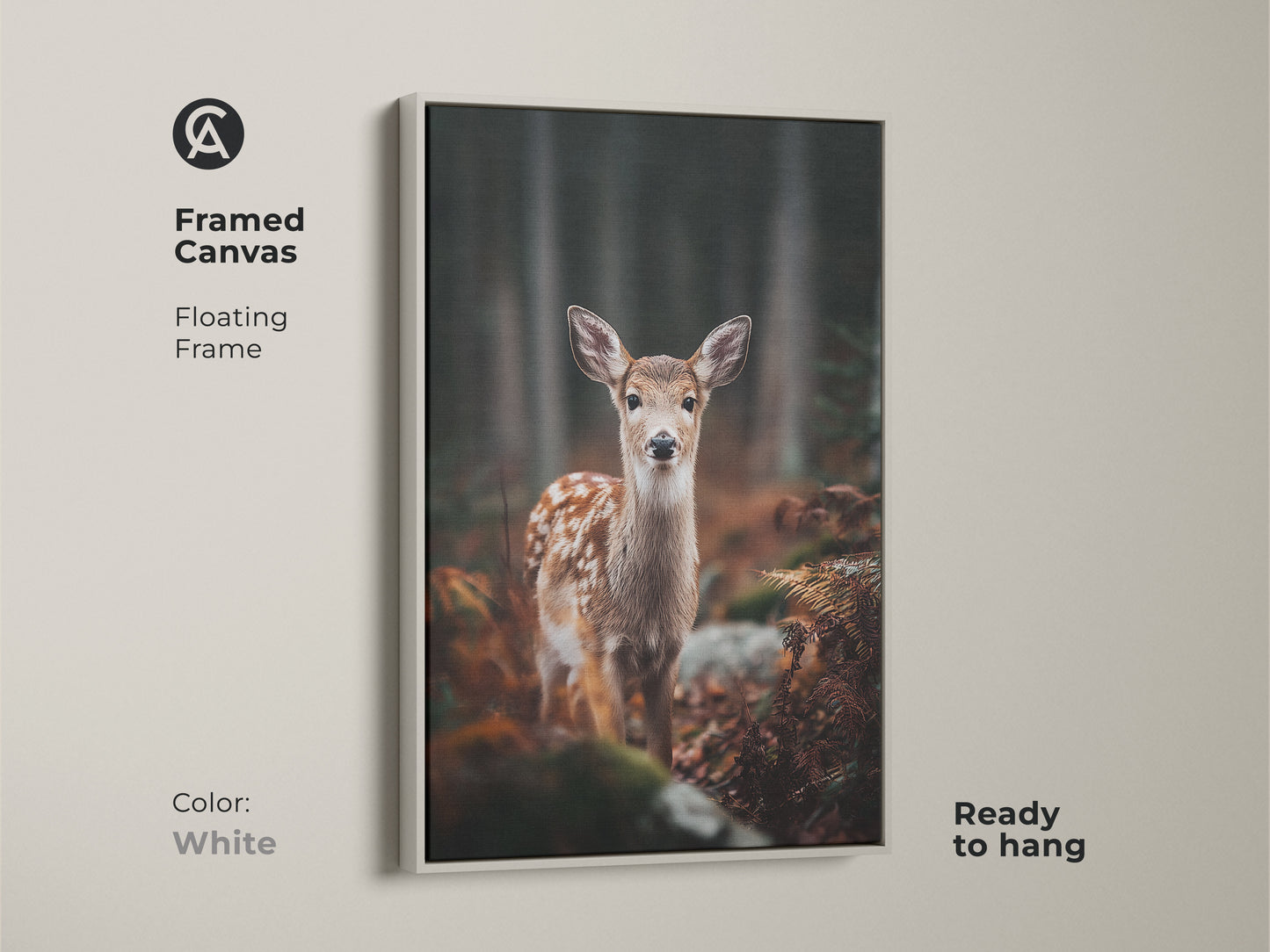 Framed canvas featuring a fawn in forest with white floating frame. Ready to hang this wildlife art adds a touch of nature. Perfect for a cozy bedroom. An ideal gift for animal and nature lovers.