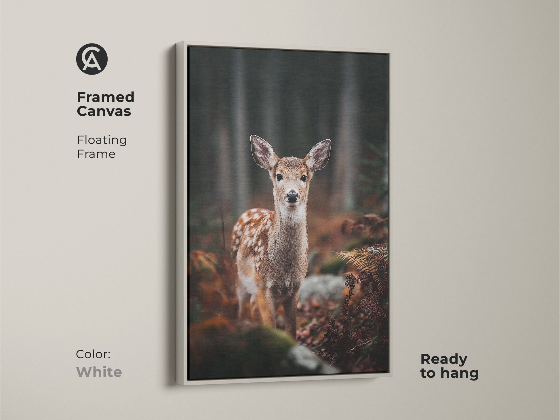 Framed canvas featuring a fawn in forest with white floating frame. Ready to hang this wildlife art adds a touch of nature. Perfect for a cozy bedroom. An ideal gift for animal and nature lovers.