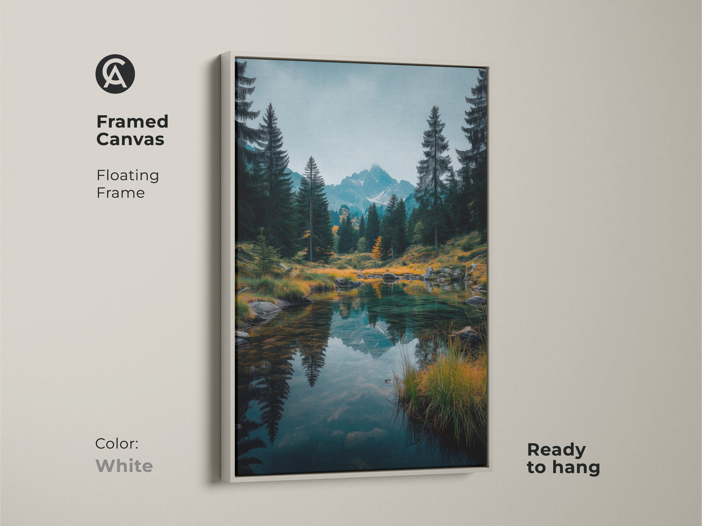 White framed canvas art. A clean white floating frame showcases the serene mountain lake artwork. It's ready to hang and brightens any space. Add a fresh touch to your home with this framed art.