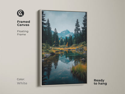 White framed canvas art. A clean white floating frame showcases the serene mountain lake artwork. It's ready to hang and brightens any space. Add a fresh touch to your home with this framed art.