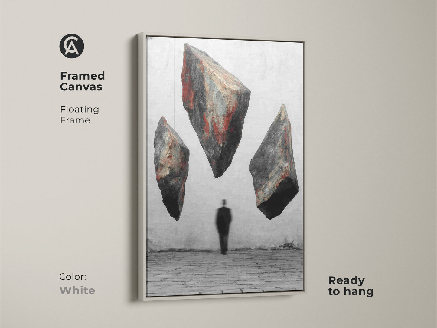White framed canvas art features floating textured rocks and a man in a suit. This red black gray artwork is a conceptual piece for your wall. The floating frame adds a modern touch. Ready to hang as an unusual wall hanging. Makes a unique statement in your home decor.