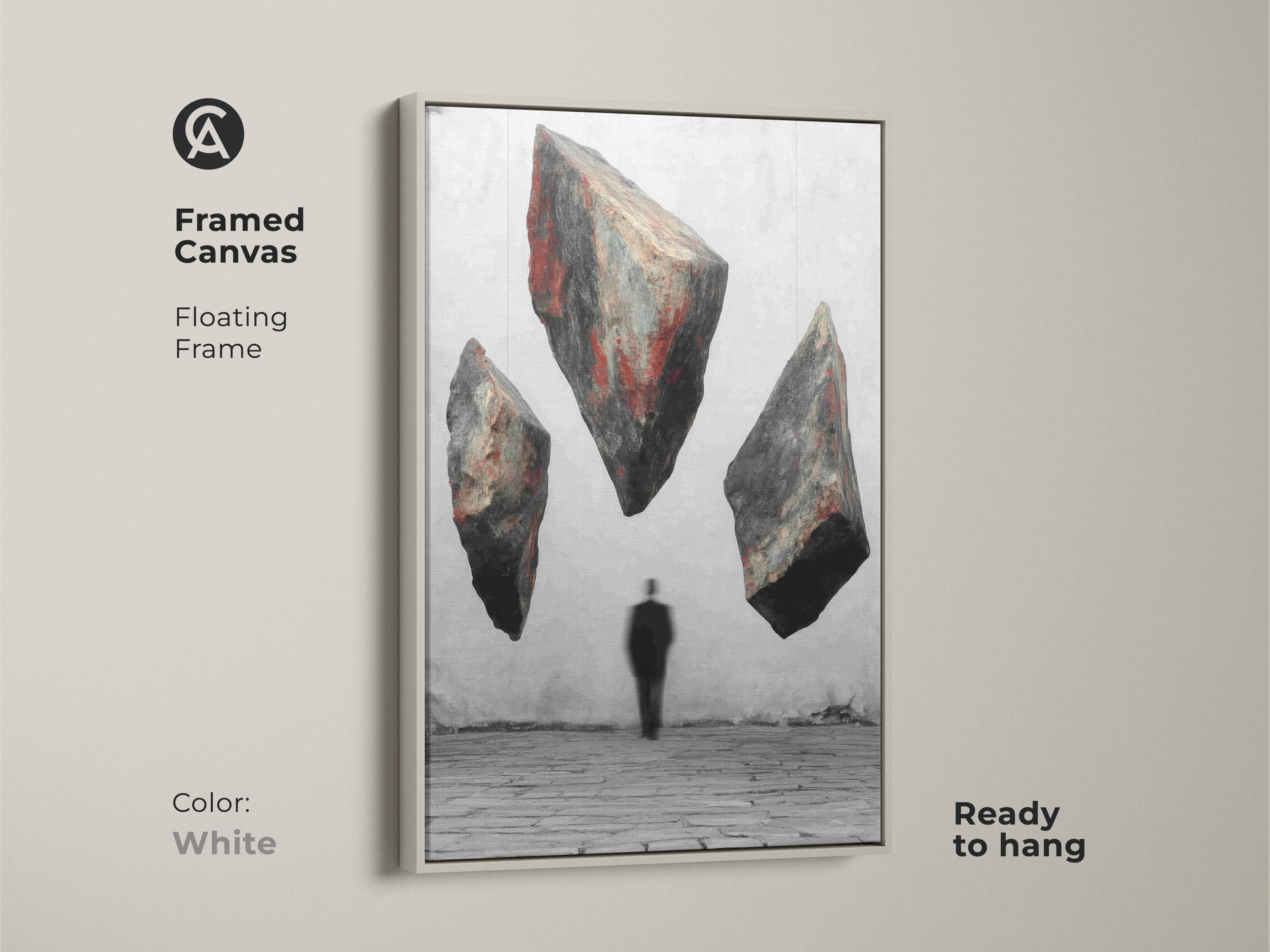 White framed canvas art features floating textured rocks and a man in a suit. This red black gray artwork is a conceptual piece for your wall. The floating frame adds a modern touch. Ready to hang as an unusual wall hanging. Makes a unique statement in your home decor.