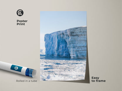Poster print of an Arctic iceberg. This minimalist glacier art is a light blue travel landscape poster. This contemporary wall decor is rolled in a tube and easy to frame for any home.