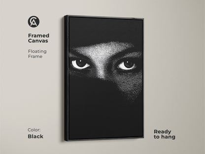 Black framed canvas showcases monochrome eyes wall art. The abstract face canvas print is minimalist portrait art. Black and white bedroom decor makes for contemporary living room art. High contrast artwork offers a modern abstract print. This mystery themed art is ready to hang.