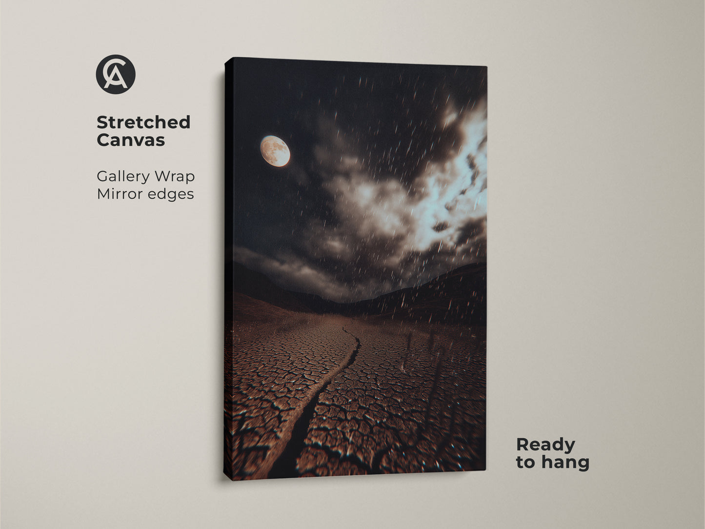 Stretched Canvas of a surreal moonlit desert landscape. Dark brown cracked earth art with a grey atmospheric night sky. This is rainy night moon phase canvas artwork. Ready to hang.