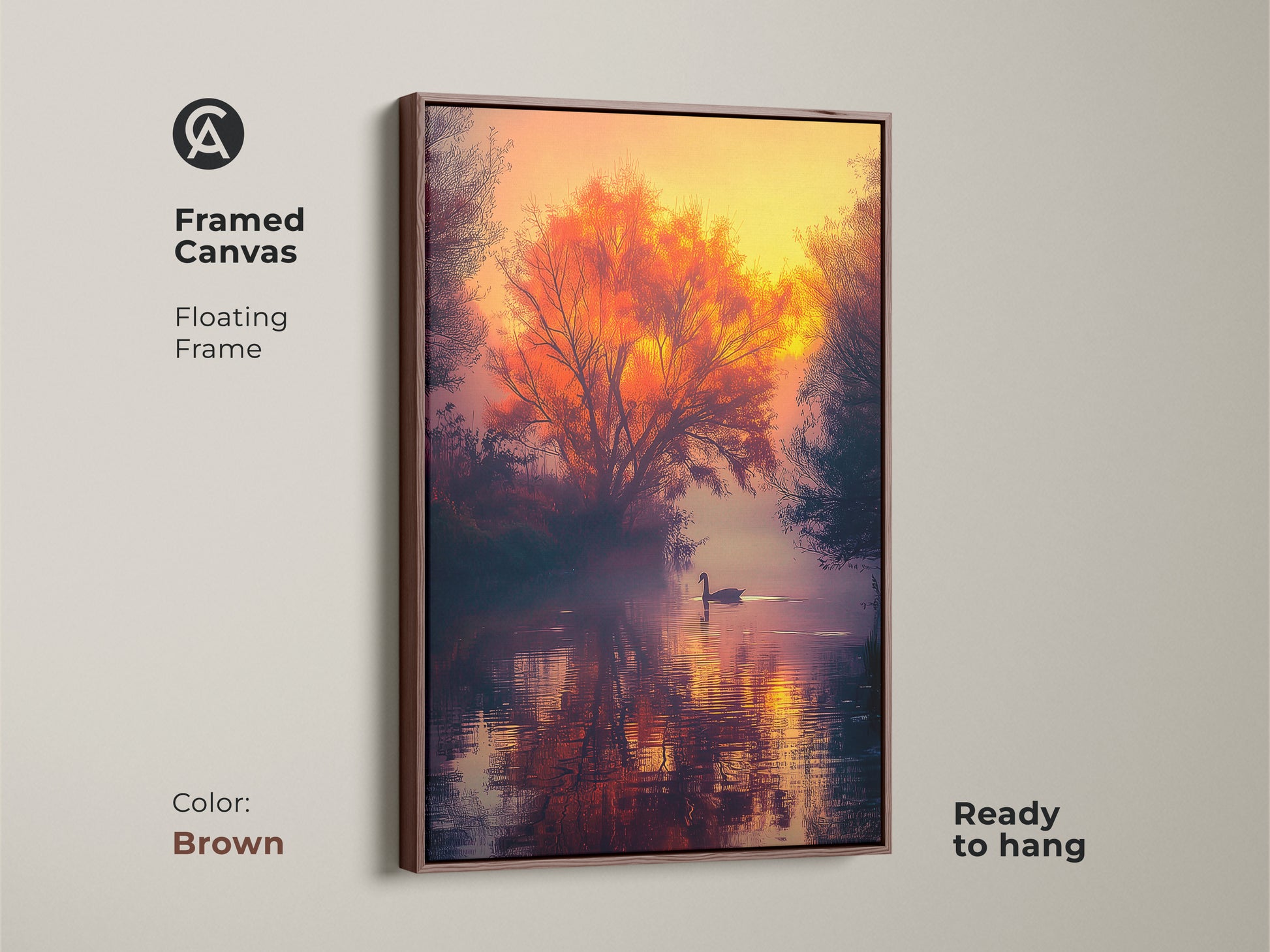 Framed canvas art of a sunset lake with a swimming swan. A vibrant orange tree reflects on water. Brown floating frame. This artwork is ready to hang. Add color to your decor with framed art.