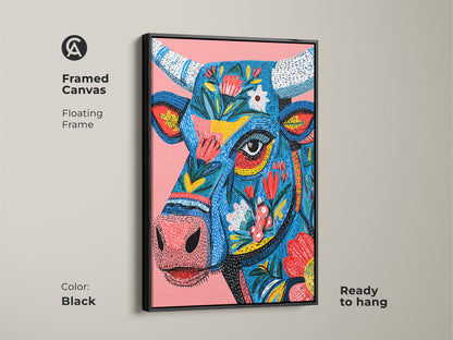 Framed canvas print of a floral bull artwork with a black floating frame. The artwork is ready to hang. The contrast of the black frame and colorful art creates a striking visual. This animal art print is perfect for a modern home. Shop today.