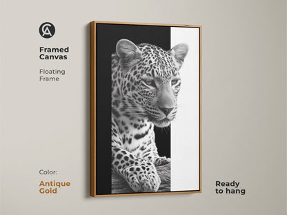 A framed canvas featuring a monochrome leopard. This floating frame comes in antique gold and is ready to hang. A black and white wildlife art piece offering contemporary animal decor. Ideal as bedroom wall art or living room art. A thoughtful gift for animal lovers to elevate their space.