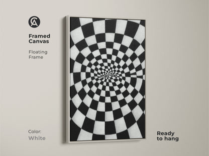 Framed Canvas Abstract Spiral Checkerboard artwork. A white floating frame surrounds the black and white Op Art Print. It is geometric wall decor for a hallway or office. This contemporary art is ready to hang.