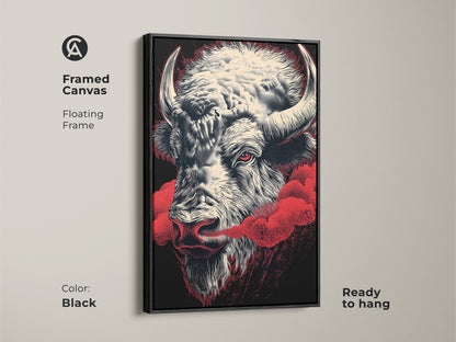 Framed canvas art showcasing a bison head with a red eye. The art is set in a floating black frame and ready to hang. The cream and black animal art features red accents. It's ideal as man cave decor or a masculine gift. The black frame enhances the artwork.