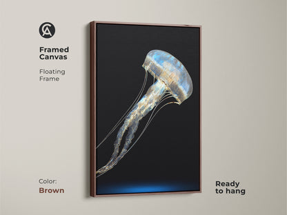 Brown framed canvas presenting abstract jellyfish. The floating frame highlights minimalist ocean art. Enhance your space with this ready to hang marine life artwork. A unique housewarming gift.