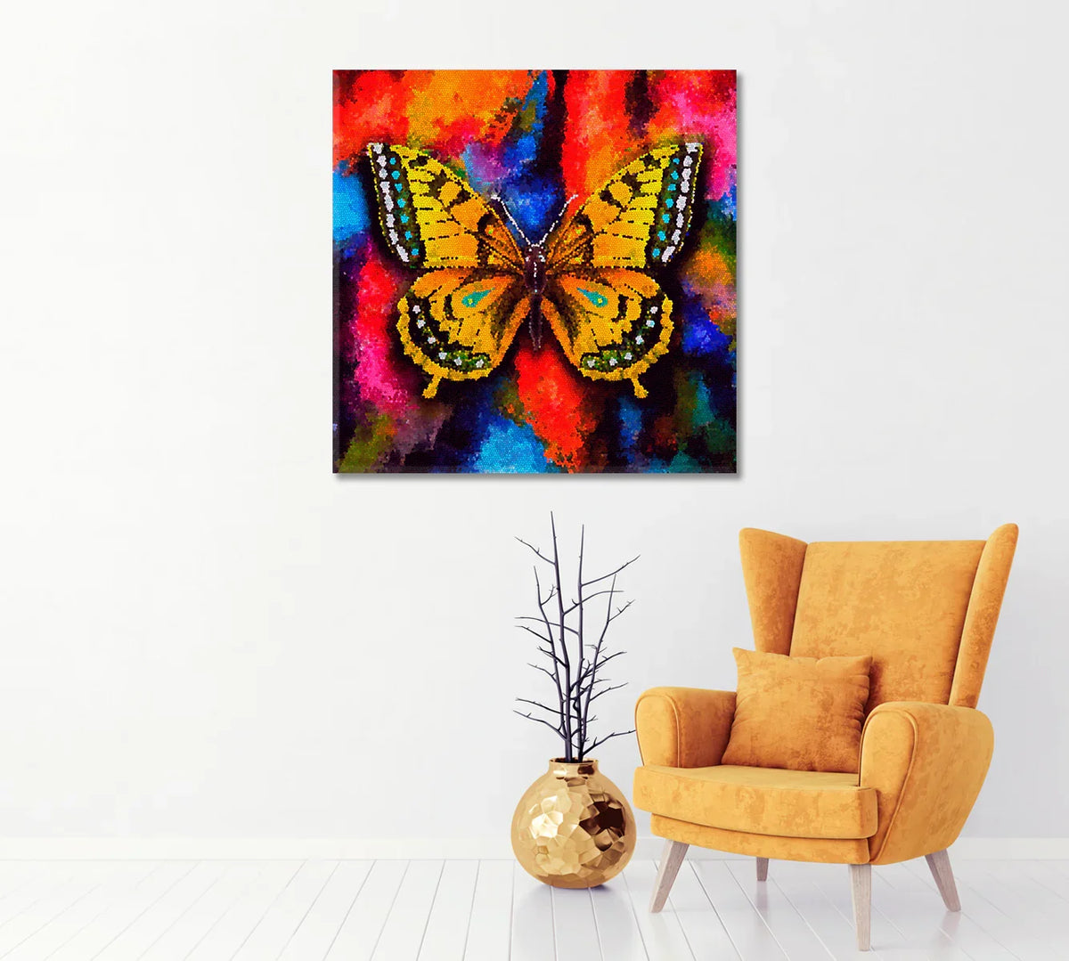 Vibrant butterfly canvas with rich red and orange background next to mustard armchair