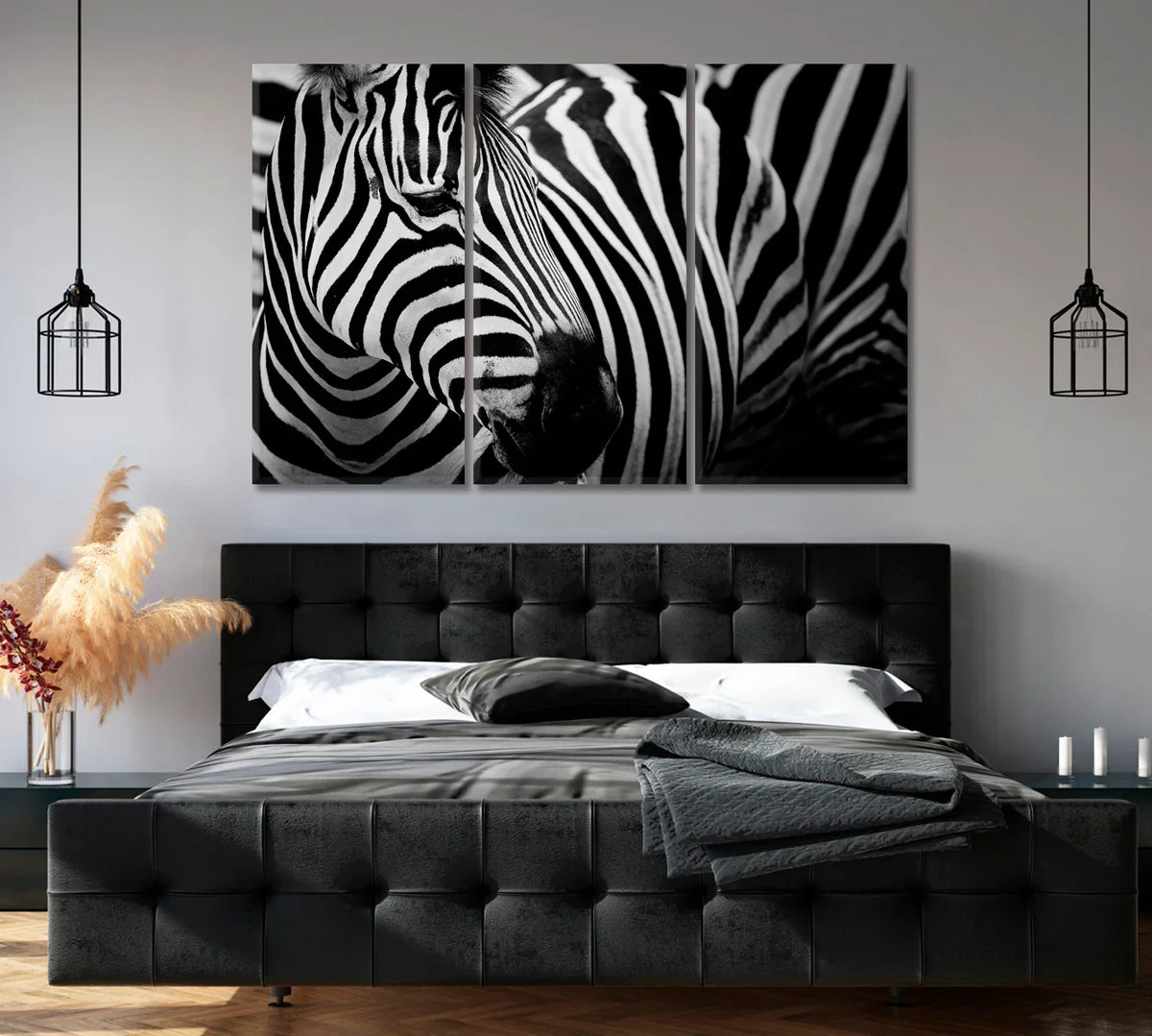 Zebra black and white canvas print above a dark headboard—bold stripes creating high-contrast focal point