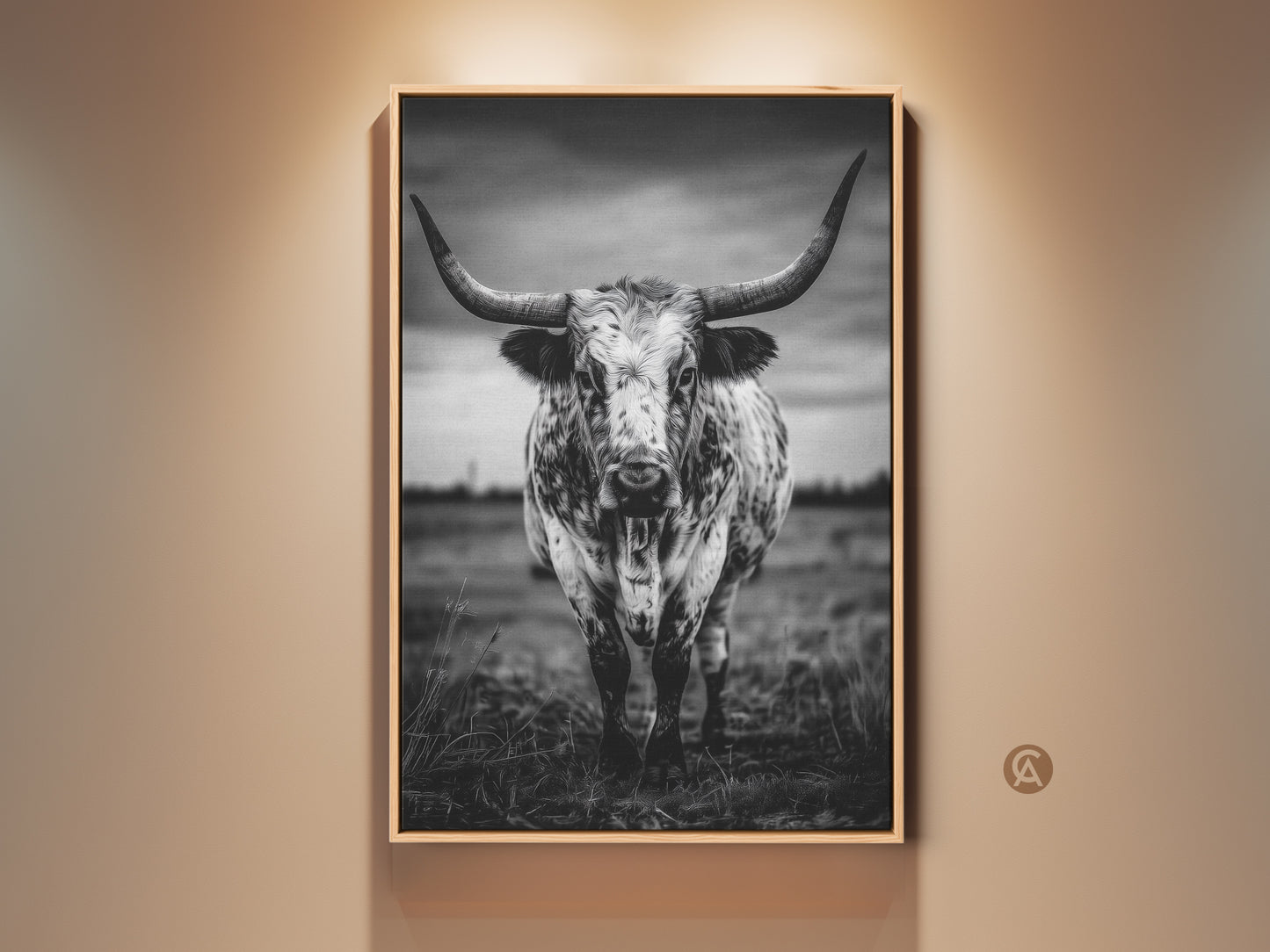 Dramatic black and white longhorn canvas print framed in natural wood. The rustic cow artwork brings a touch of Texas animal decor to any space. Its a striking entryway statement piece. The monochrome palette will complement farmhouse or modern interiors making it a versatile addition to your home or office.