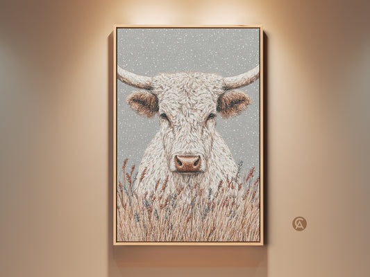 Framed artwork of a white longhorn bull with lavender plants. The bull has long horns and a serene expression. The artwork is framed in a light wood frame. It creates a rustic yet elegant feel.