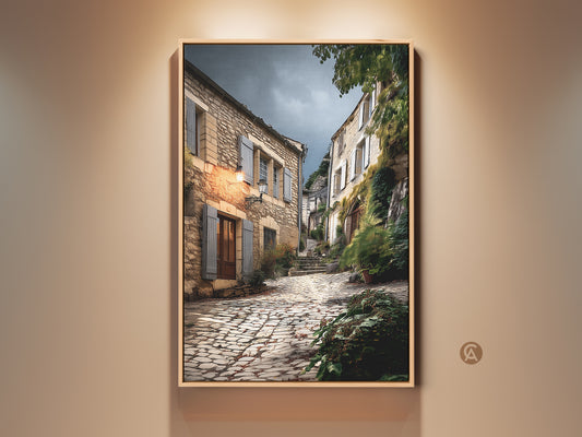 Charming European village street art print. A cobblestone path leads through rustic beige and brown buildings. This artwork brings old-world charm to any home. Perfect as a housewarming gift for travel enthusiasts. The painterly style evokes a warm and cozy ambiance. A scenic landscape print that captures European beauty.