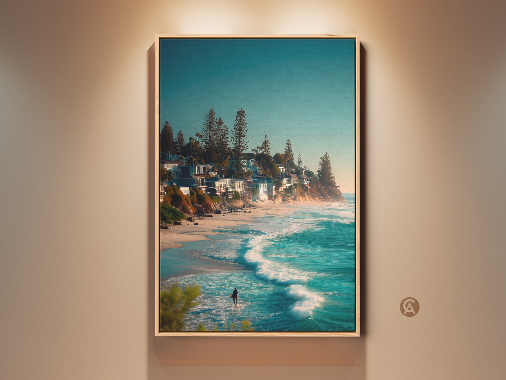 Framed canvas art of a surfer walking into the ocean. The artwork captures a serene beach scene with turquoise waves and a coastal neighborhood. This framed art is ready to hang and brings a touch of coastal charm to any room.